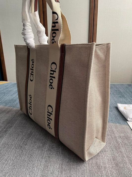 LAGRE STRAP WOODY TOTE BAG 45 IN BEIGE LINEN CANVAS BLACK WEBBING LOGO EMBROIDER BROWN CALFSKIN