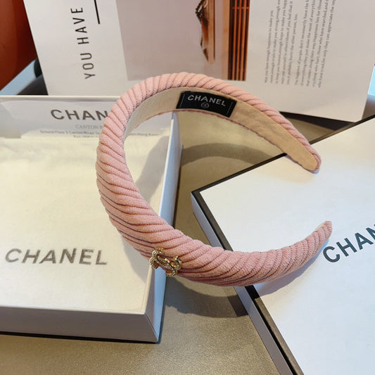 LIGHT PINK FABRIC HAIRBAND WITH GOLD LOGO 414436