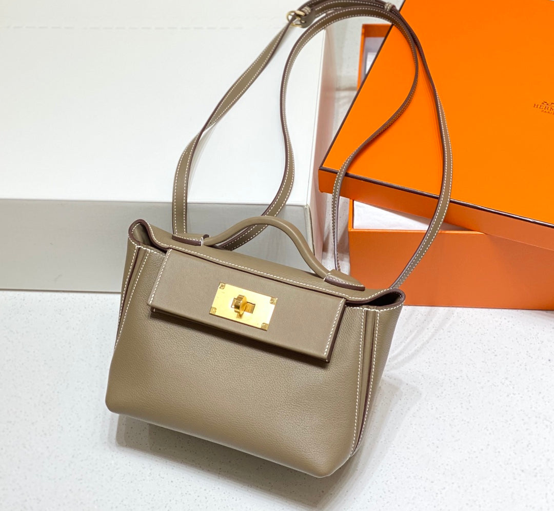 MINI 24/24 21CM IN TOGO ETOUPE EVERCOLOR CALFSKIN GOLD KELLY BUCKLE
