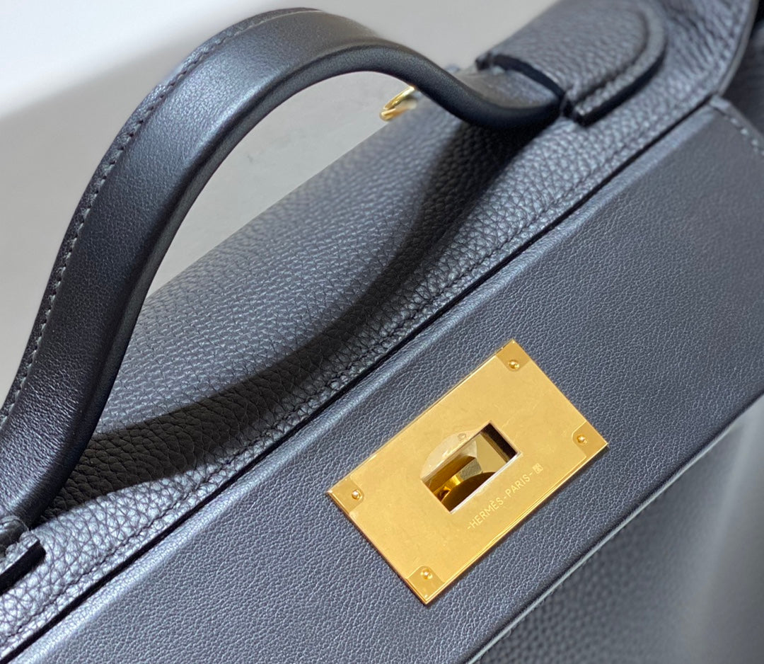 MINI 24/24 29CM IN BLACK EVERCOLOR CALFSKIN GOLD KELLY BUCKLE