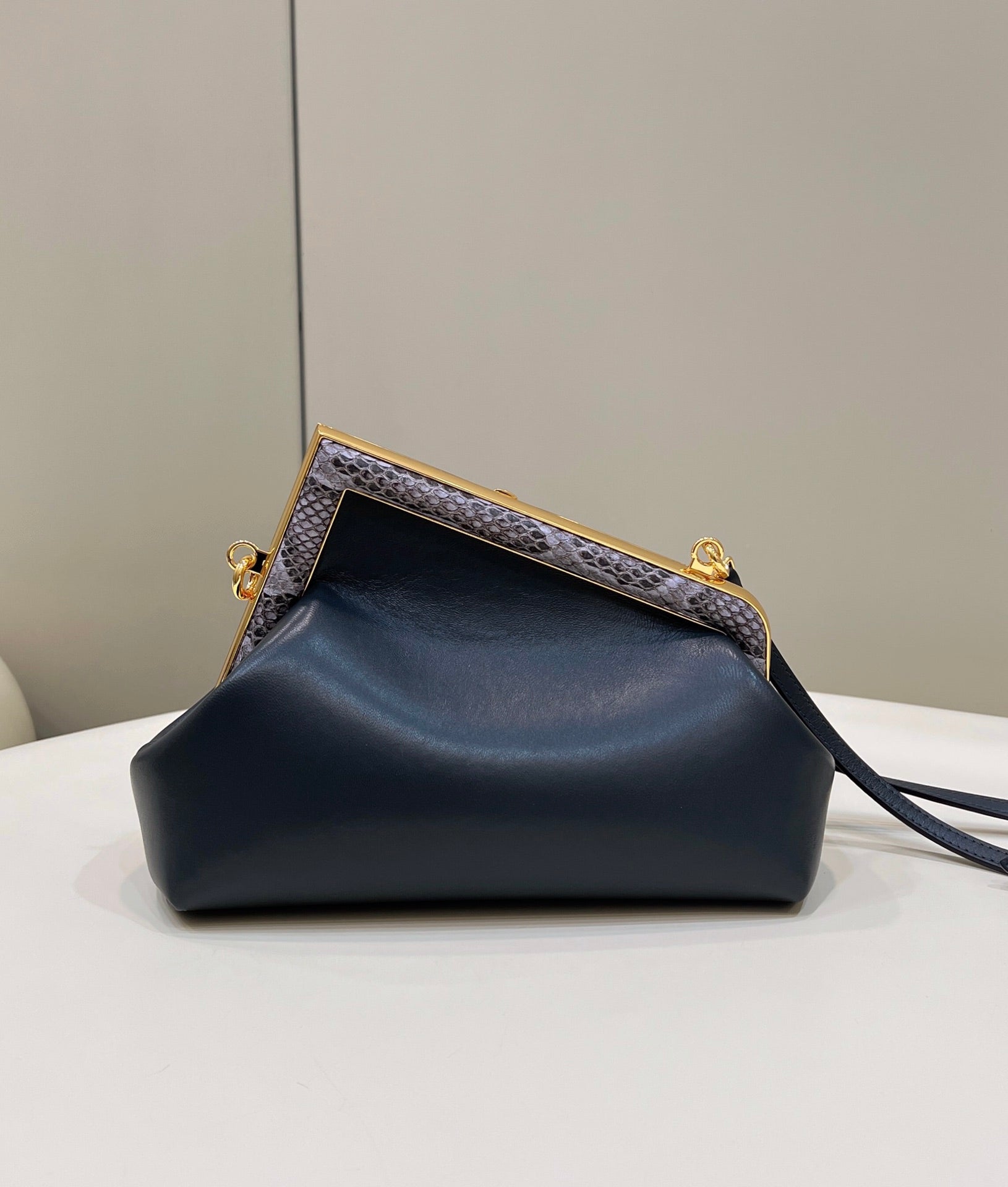 FENDI FIRST SMALL 26 BLACK LEATHER BAG WITH EXOTIC DETAILS