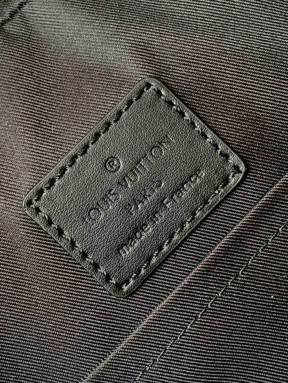 DISCOVERY BACKPACK 41 IN BLACK MONOGRAM MACASSAR CANVAS AND CALFSKIN