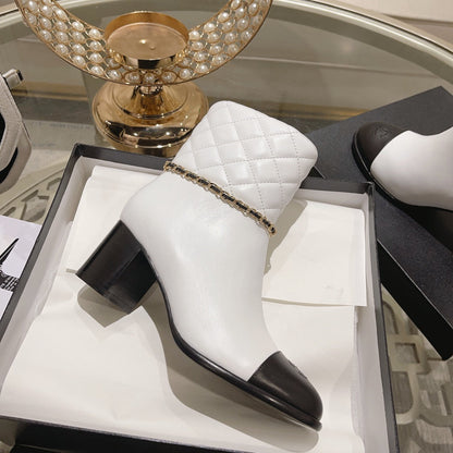 MID-HEEL ANKLE BOOTS IN WHITE CALFSKIN