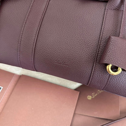 LOOM BAG 25 IN WINE PURPLE CALFSKIN WITH GOLD HARDWARE