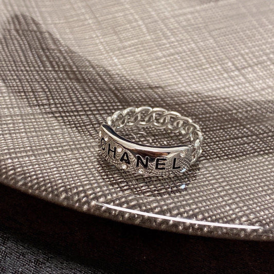 CC  RING LETTER DOUBLE C IN SILVER DIAMOND BLACK EMBOSSED LOGO