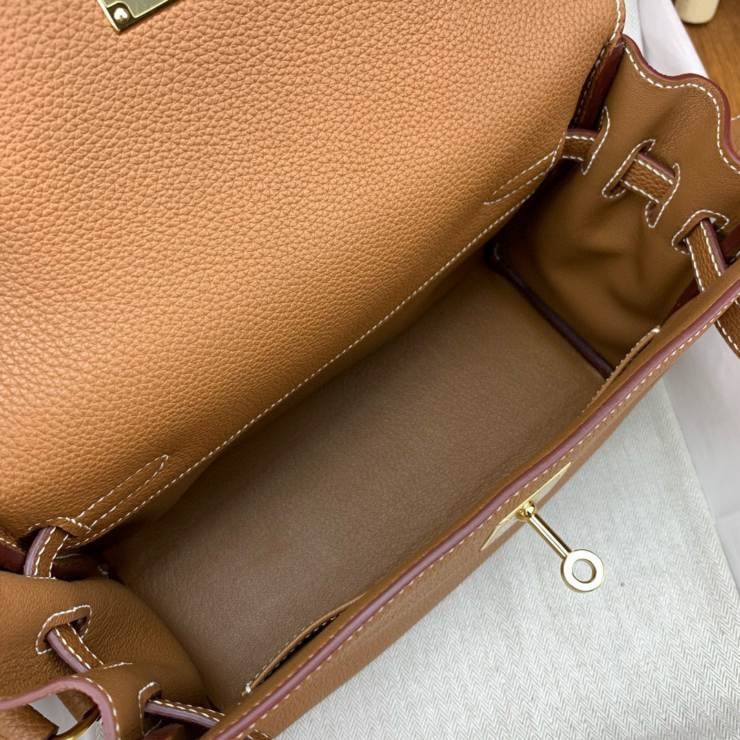 HERM KELLY MESSENGER 25