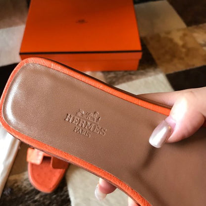 HERM Oran Slide Sandals In Orange Ostrich Leather