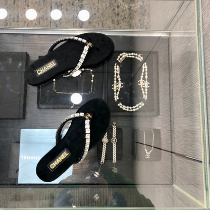 THONG SLIDE IN BLACK SUEDE WITH WHITE CRYSTALS