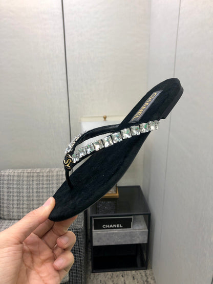 THONG SLIDE IN BLACK SUEDE WITH WHITE CRYSTALS