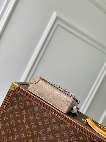 STEAMER WEARABLE WALLET 18 IN LIGHT BROWN MONOGRAM TAURILLON CALFSKIN