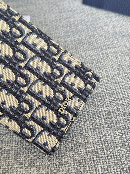 VERTICAL LONG WALLET 19 IN BLUE MONOGRAM OBLIQUE JACQUARD