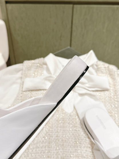 FLAT MULES IN WHITE SMOOTH CALFSKIN SILVER BUCKLE