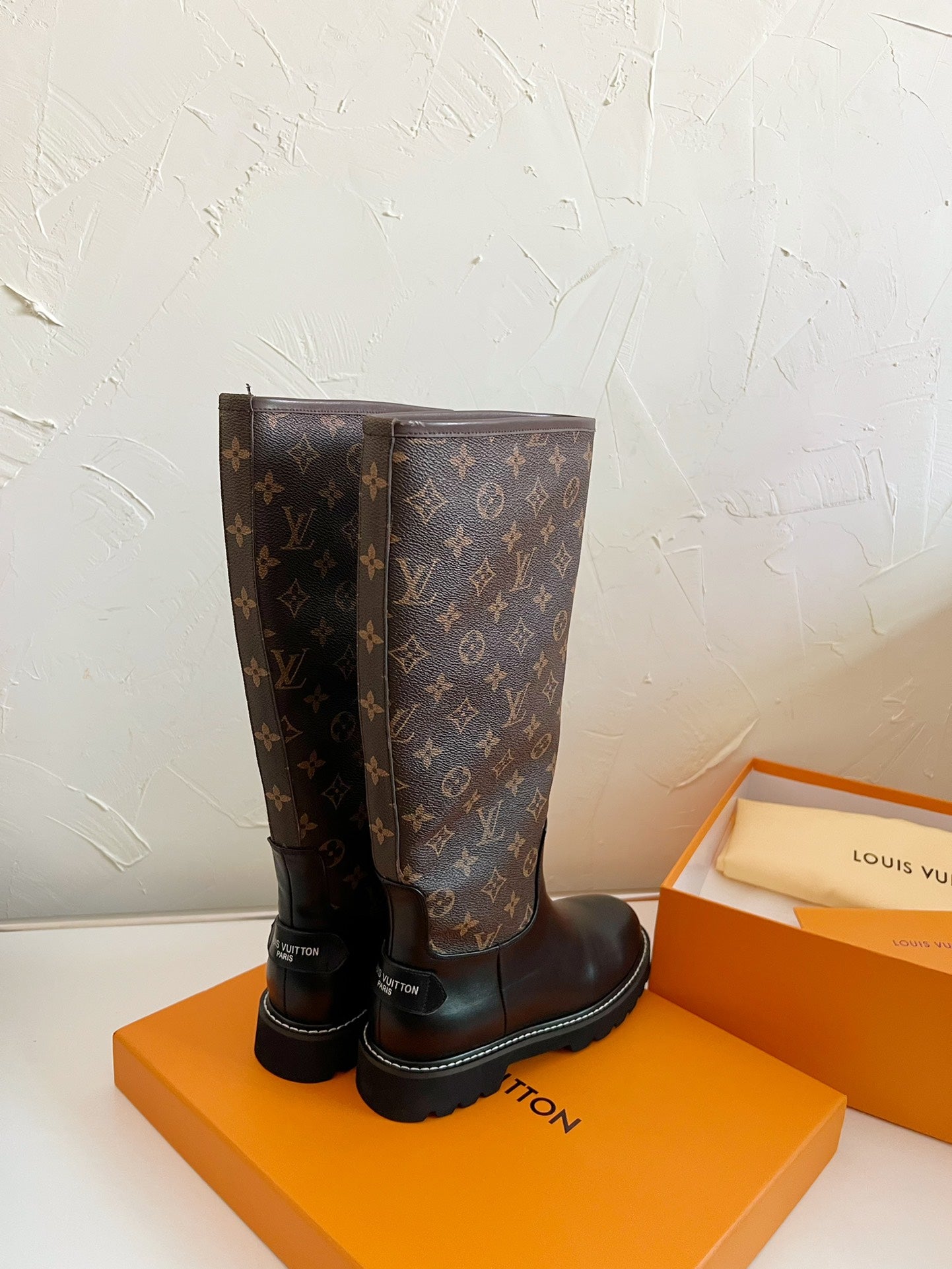 TERRITORY FLAT HIGH BOOT IN BLACK MIX CHOCOLATE BROWN MONOGRAM CALFSKIN