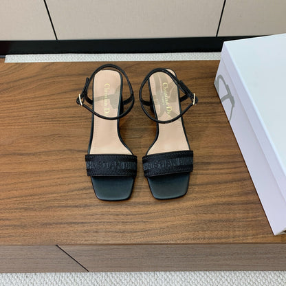 HIGH HEEL EMBROIDERED SANDAL IN BLACK CALFSKIN AND WOVEN STRAPS