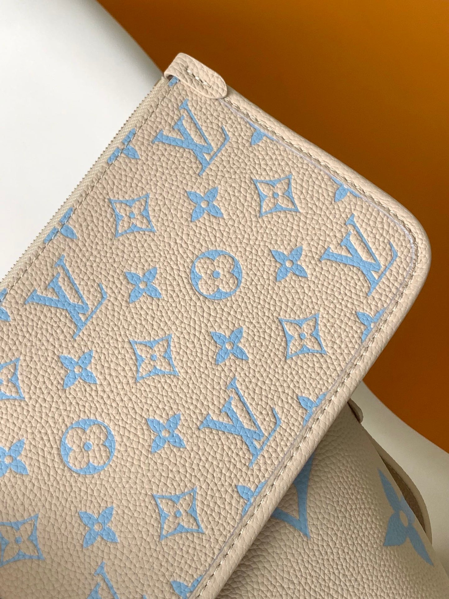 CARRYALL PM 29 BAG IN BEIGE MIX BLUE MONOGRAM EMPREINTE LEATHER