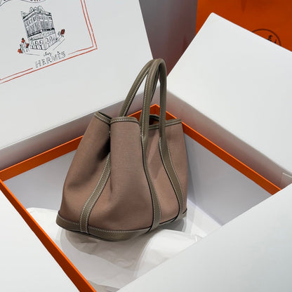 GARDEN PARTY 30CM IN BROWN TOILETS COTTON CANVAS AND TOGO ETOUPE CALFSKIN