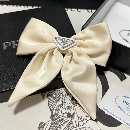 BOW-KNOT HAIR CLIP IN EGG SHELL SILK 358294