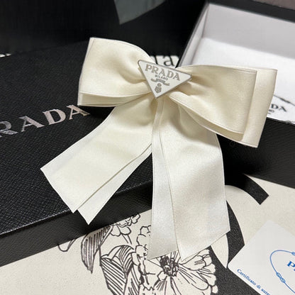 BOW HAIR CLIP IN BREEZY BEIGE RE-NYLON 423592