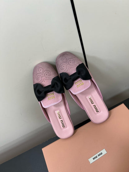 BOW MULES IN DUST PINK SUEDE