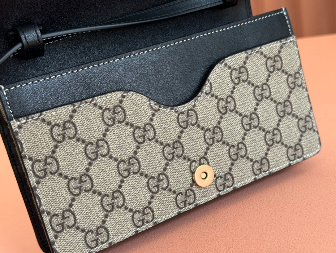 EMBLEM WALLET GG MONOGRAM 20 IN DARK BROWN AND BLACK CALFSKIN