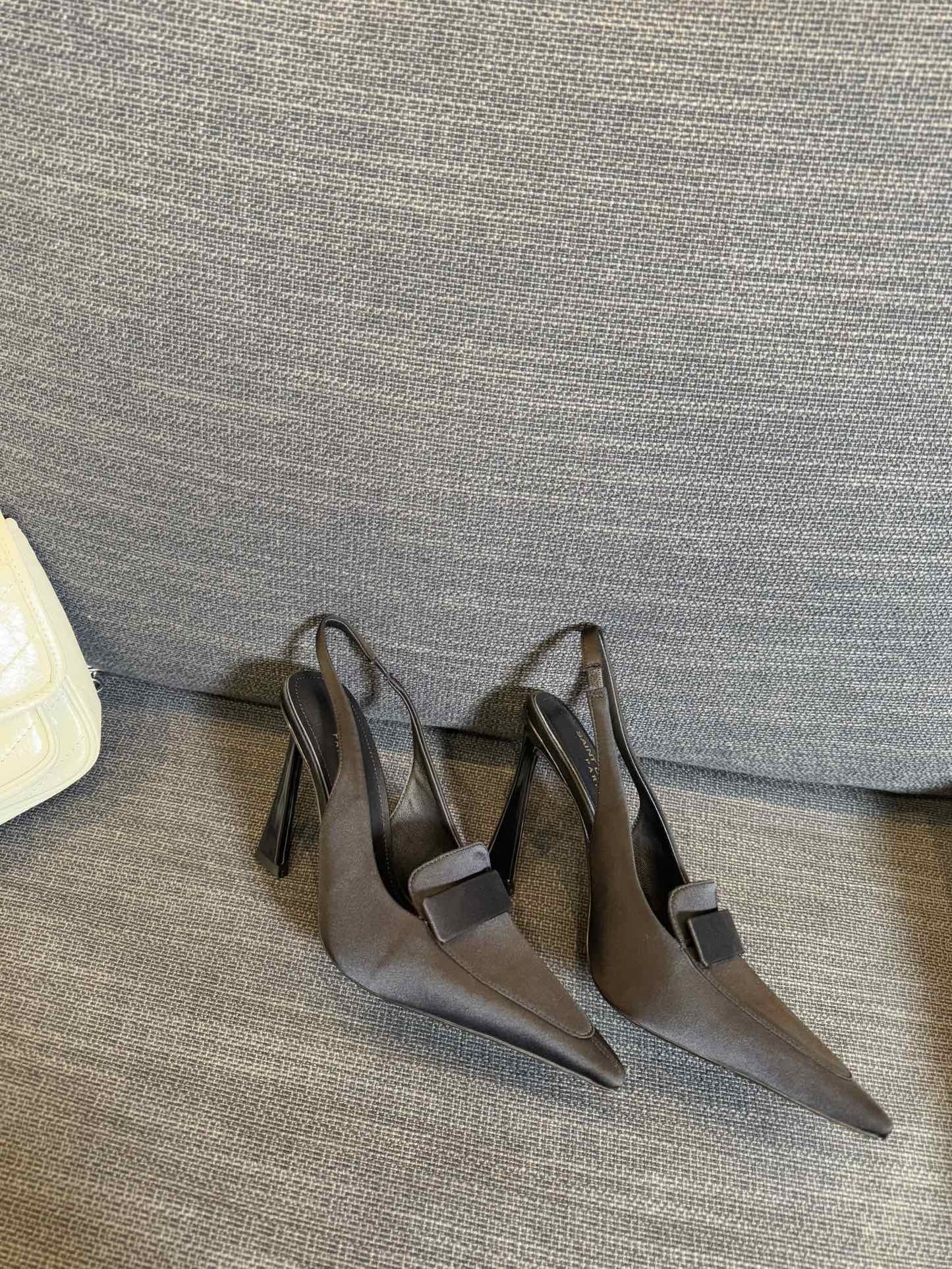 POINTED-TOE SLINGBACK PUMPS IN BLACK SILK