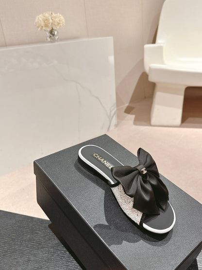 BOW LADY SLIPPERS BLACK LAMBSKIN WITH WHITE RHINESTONES