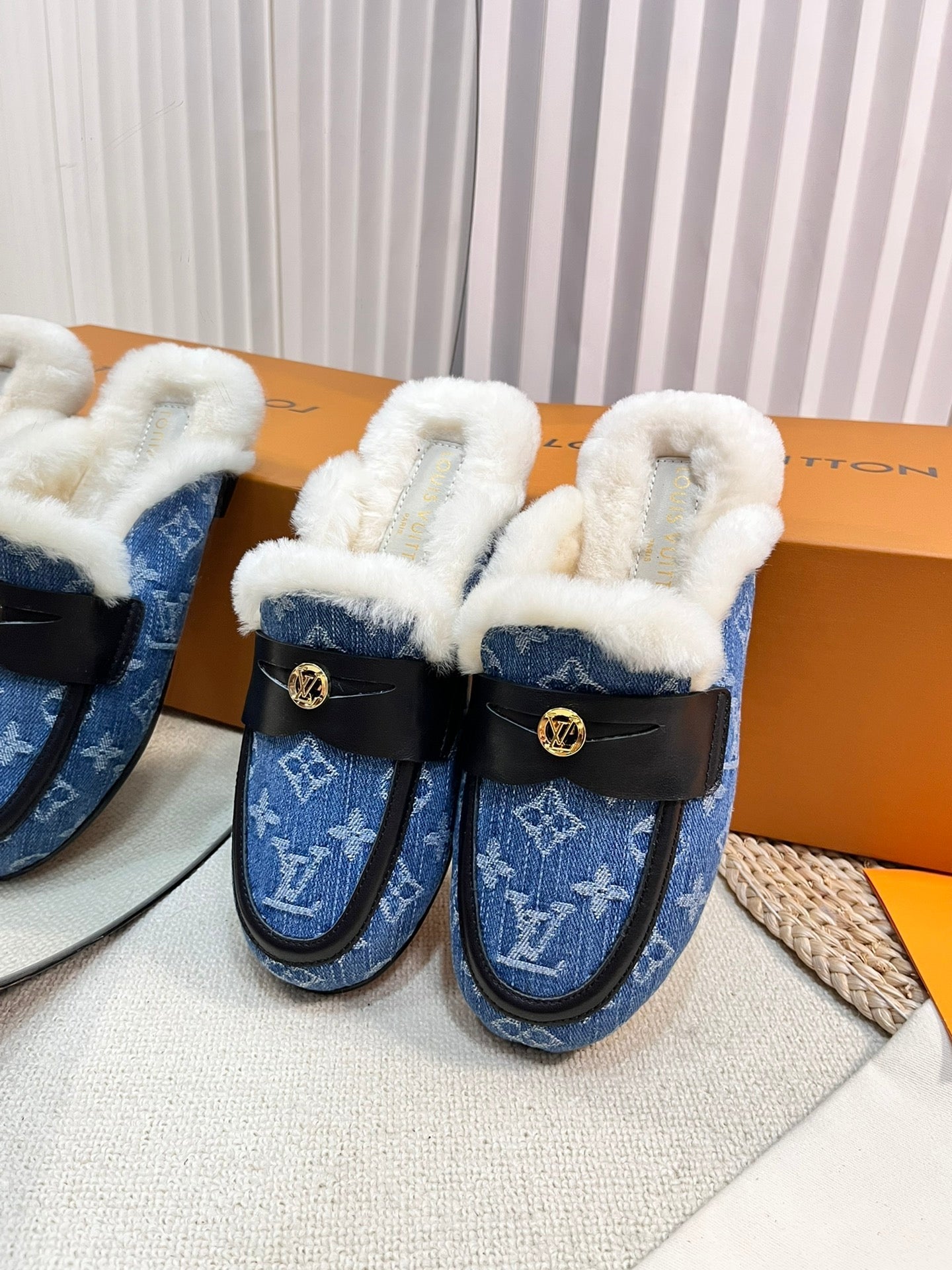 FLAT MULE IN COBALT BLUE MONOGRAM DENIM AND SHEARLING LINING