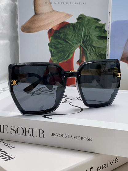TRIOMPHE SUNGLASS 497831 IN BLACK ACETATE EMBOSSED LOGO