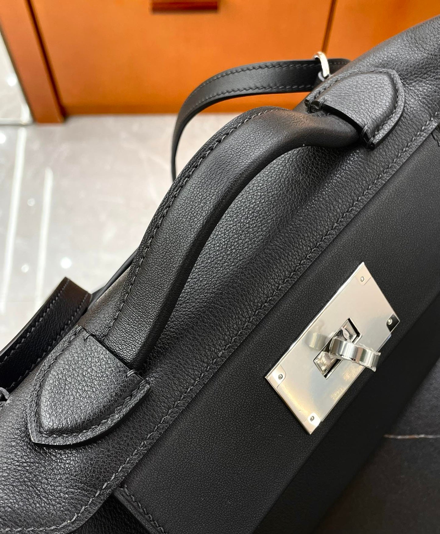 MINI 24/24 21CM IN BLACK EVERCOLOR CALFSKIN SILVER KELLY BUCKLE