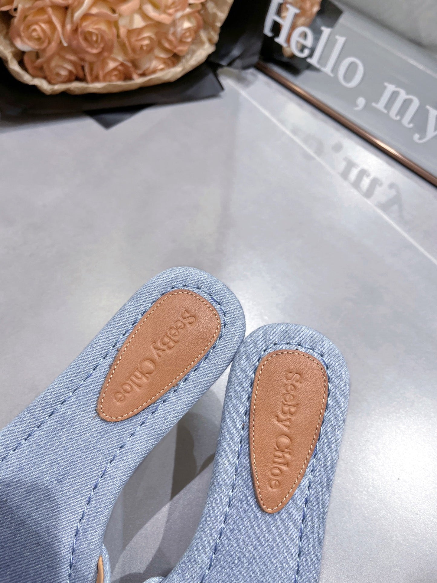 SLIDE MULE IN LIGHT BLUE DENIM AND BROWN CALFSKIN GOLD HARDWARE