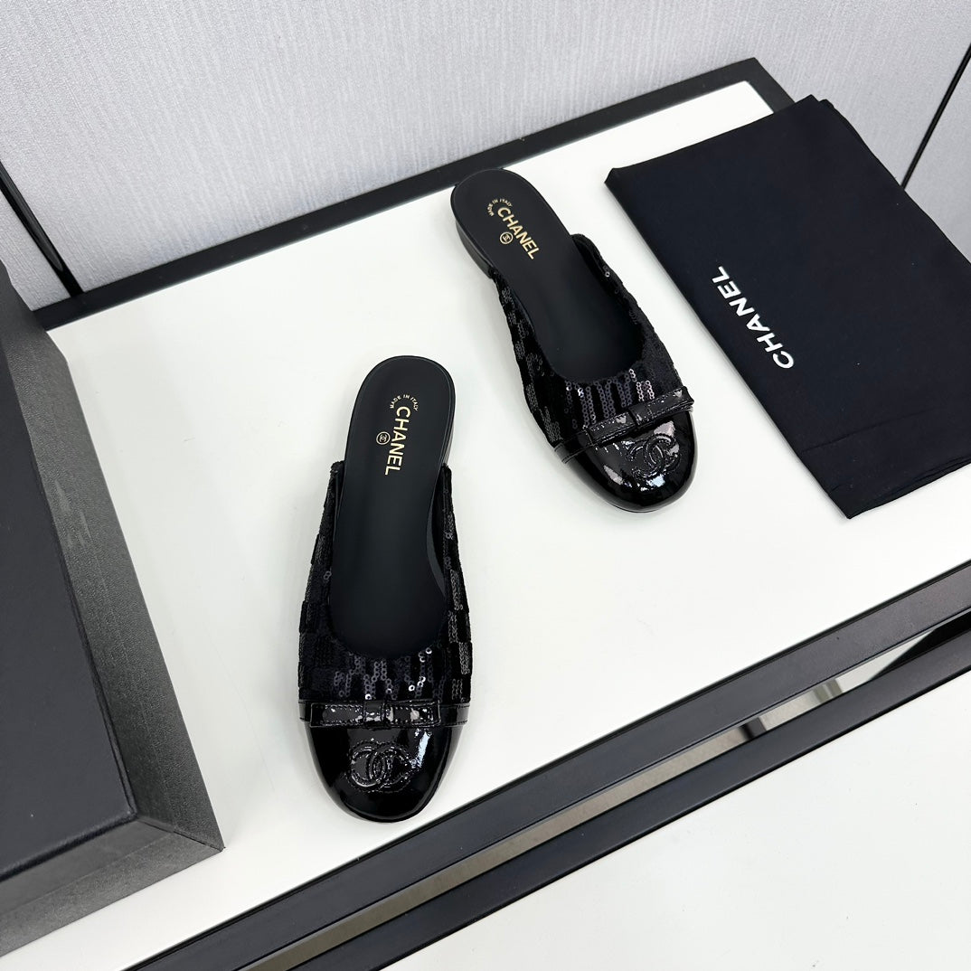 BOW MULE IN BLACK FABRIC AND CALFSKIN