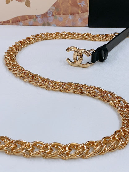 TWISTED GOLD CHAIN BELT IN GOLD METAL BLACK CALFSKIN GOLD BUCKLE
